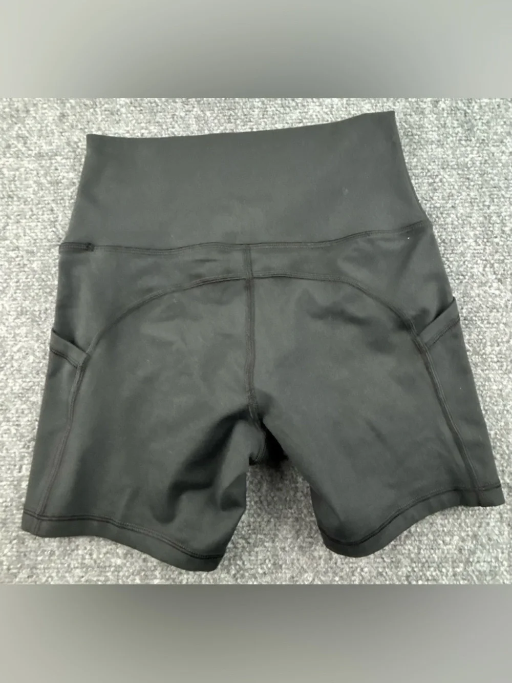 OFFLINE By Aerie The Hugger High Waisted Pocket Bike Short in Black, size M
